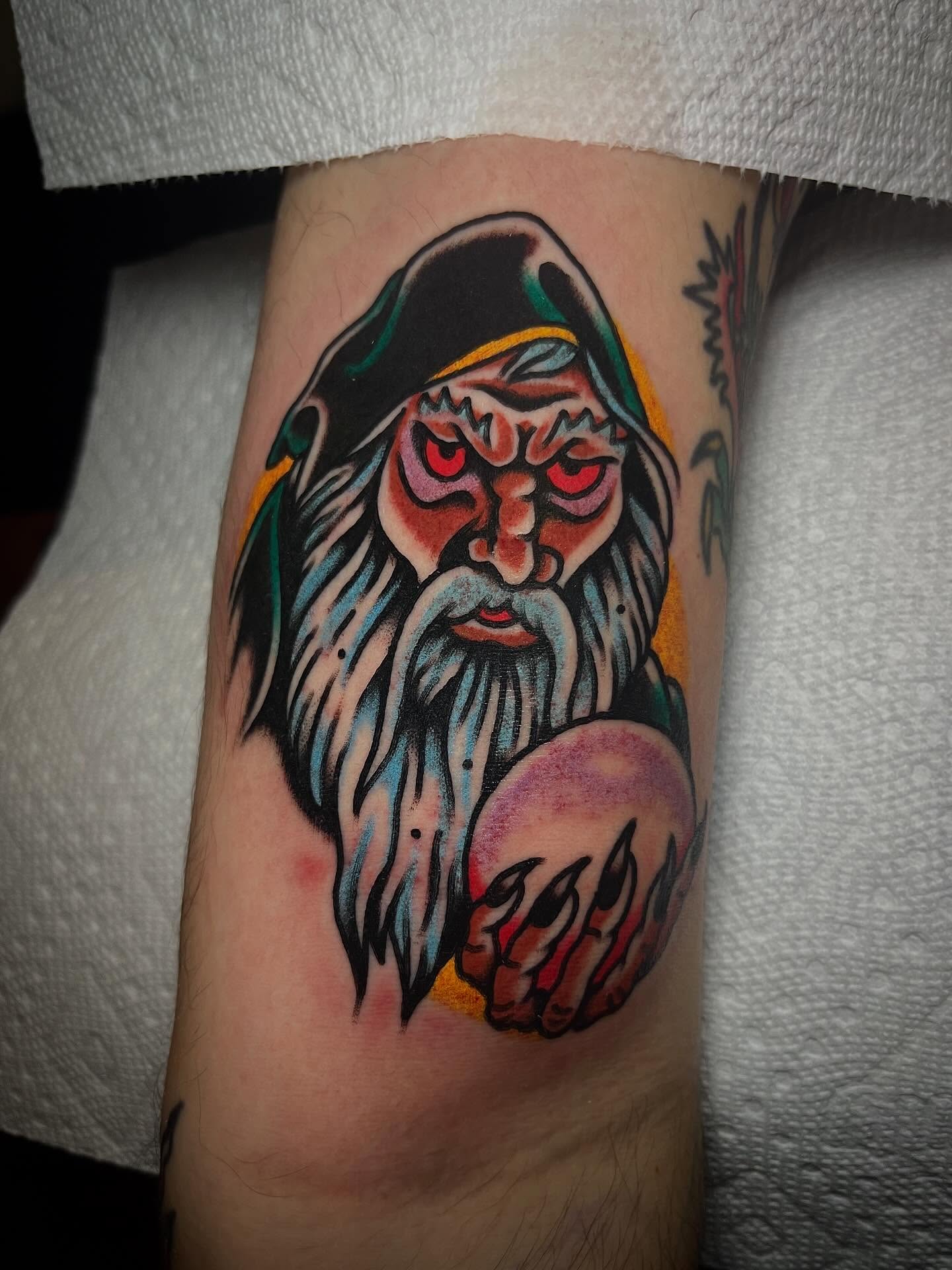 Wizard American traditional tattoo on the forearm by Jake LiCausi