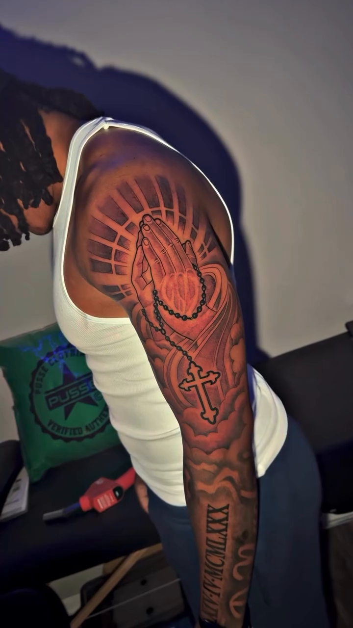 Praying hands with rosary and cross realism tattoo by Atlanta Tattoo Artist βπ½