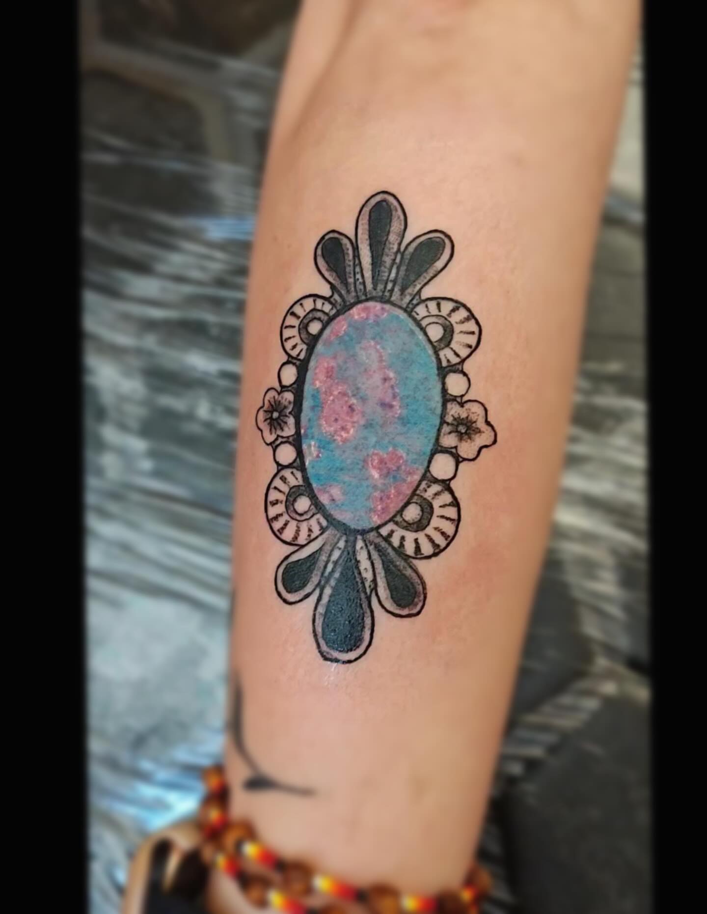 Abstract floral ornamental tattoo on the forearm by Sebastiana