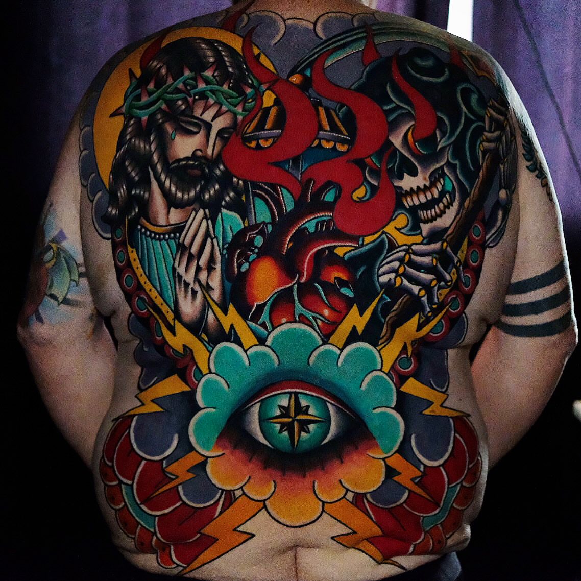 Religious iconography American traditional tattoo on the back by Don Boos Tattoos