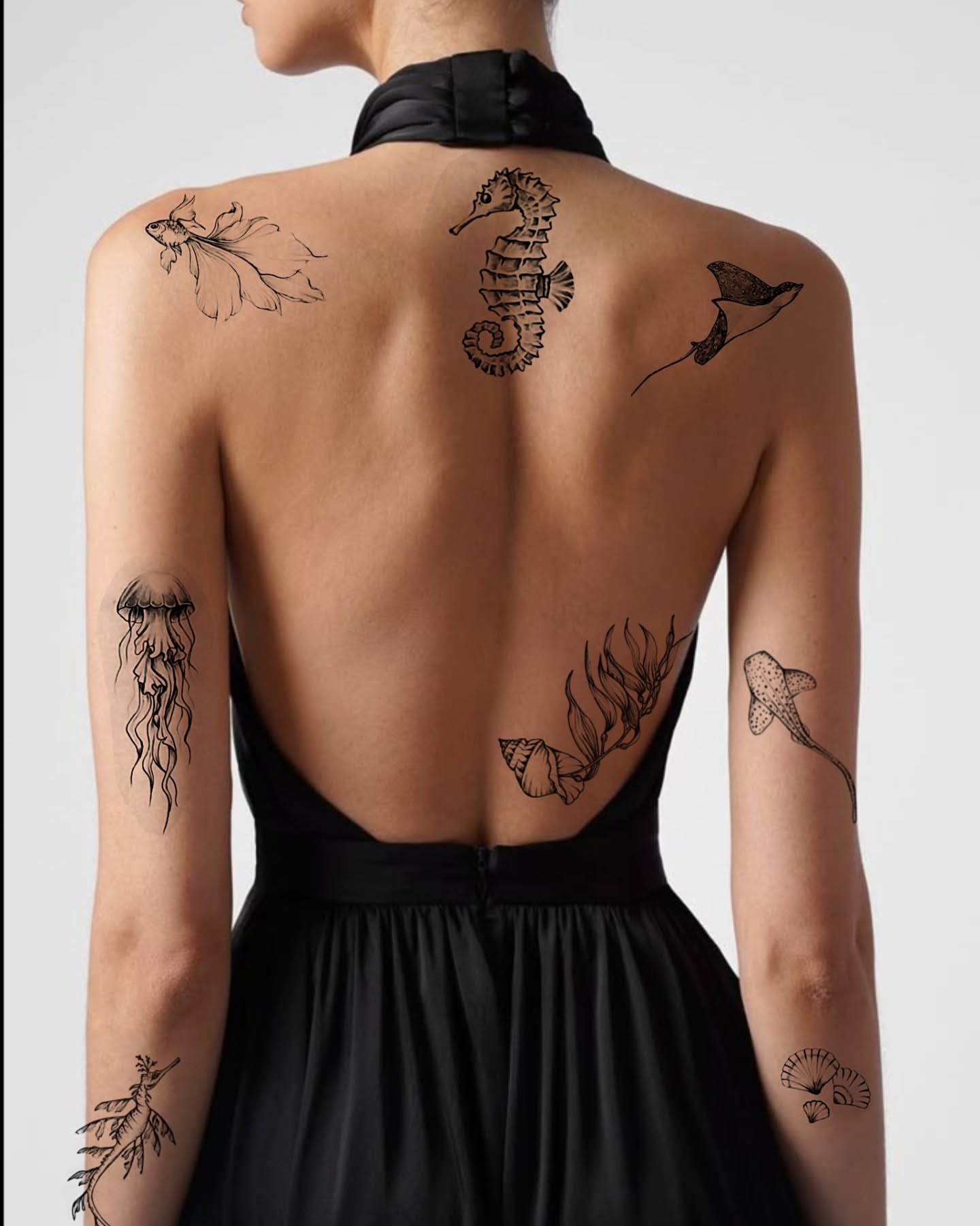 Underwater creatures black and grey tattoo on the back by Tattoo artist - Luciana Dsilva, San Francisco, California