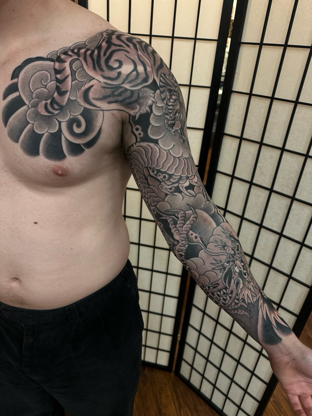 Dragon and clouds japanese irezumi tattoo on the upper arm by Sequoia Rose, Portland, Oregon