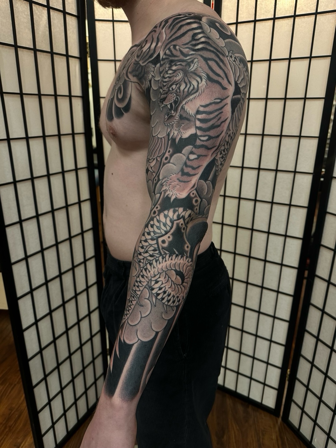 Tiger and dragon japanese irezumi tattoo on the upper arm by Sequoia Rose, Portland, Oregon