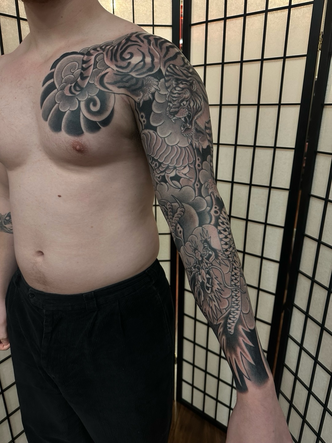 Floral and dragon japanese irezumi tattoo on the upper arm by Sequoia Rose, Portland, Oregon