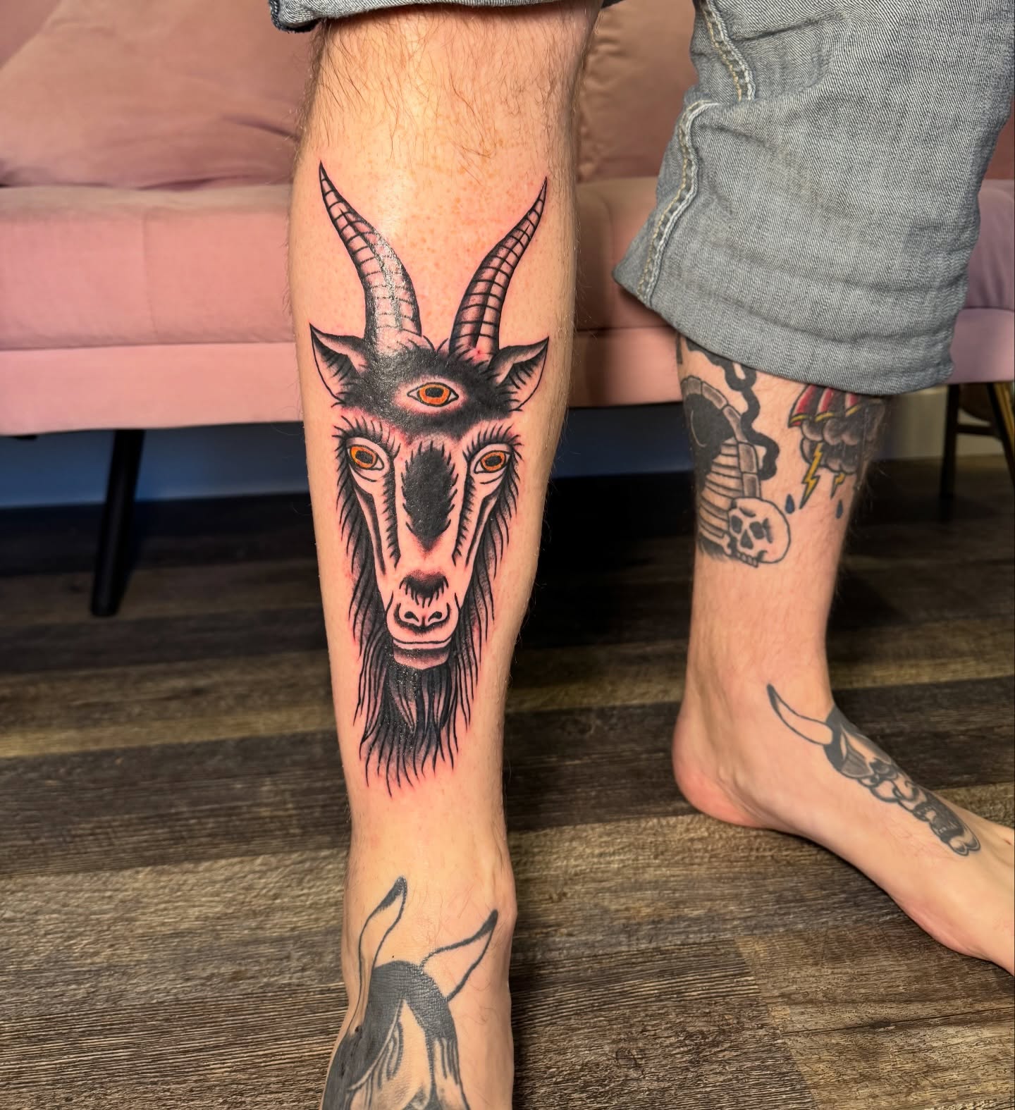 Goat head realism tattoo on the calf by Kinzi Brown