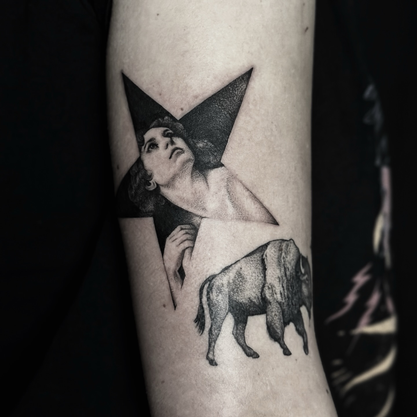 Woman with wings dotwork tattoo on the forearm by Zoe Arrigo