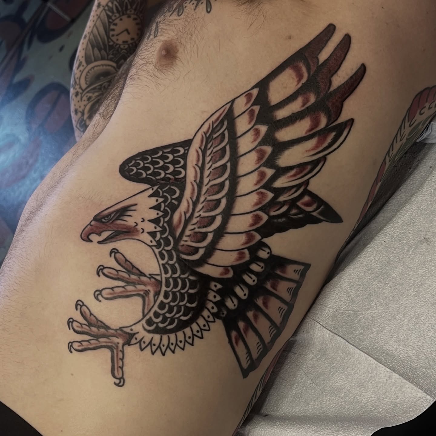 Eagle American traditional tattoo on the thigh by @brandonhuckabey, Denver, Colorado