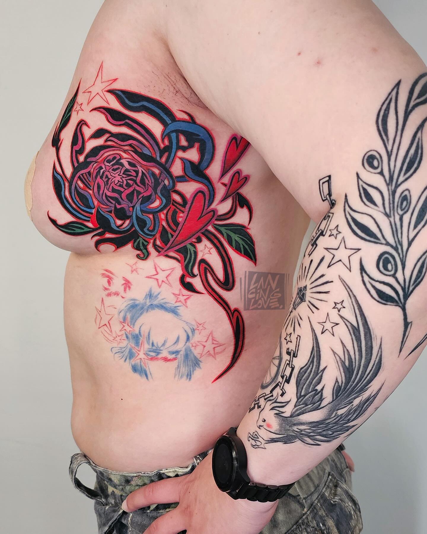 Flower and stars American traditional tattoo on the thigh by Lancinglove