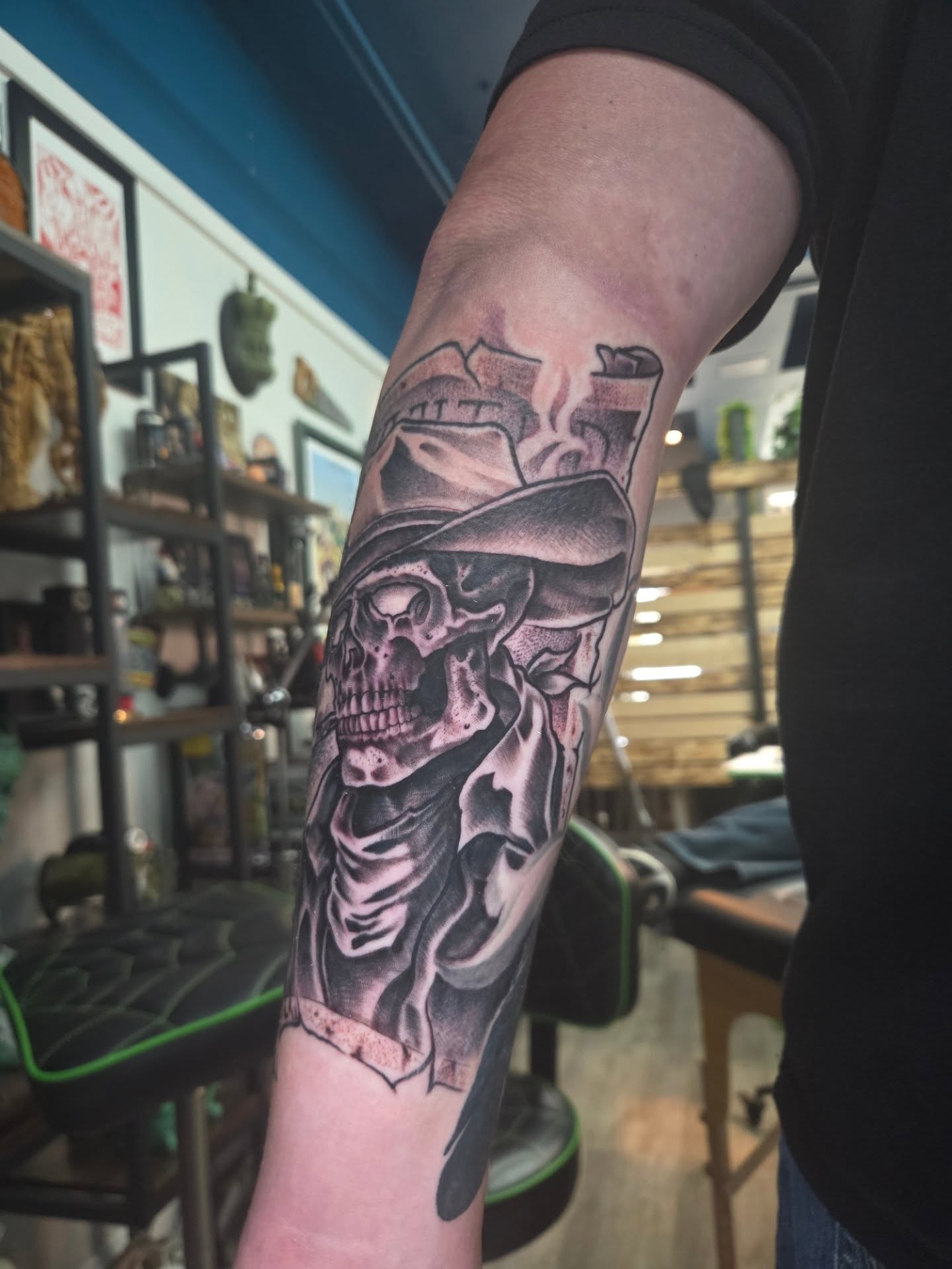 Cowboy skull with cigarette realism tattoo on the forearm by Geo