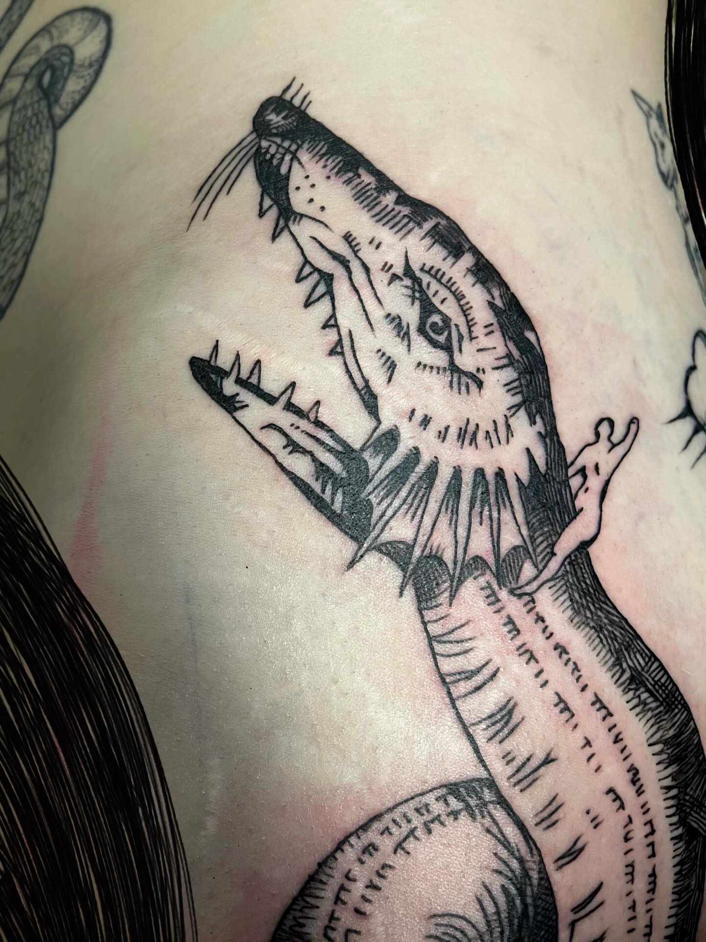 Crocodile black and grey tattoo on the thigh by ren