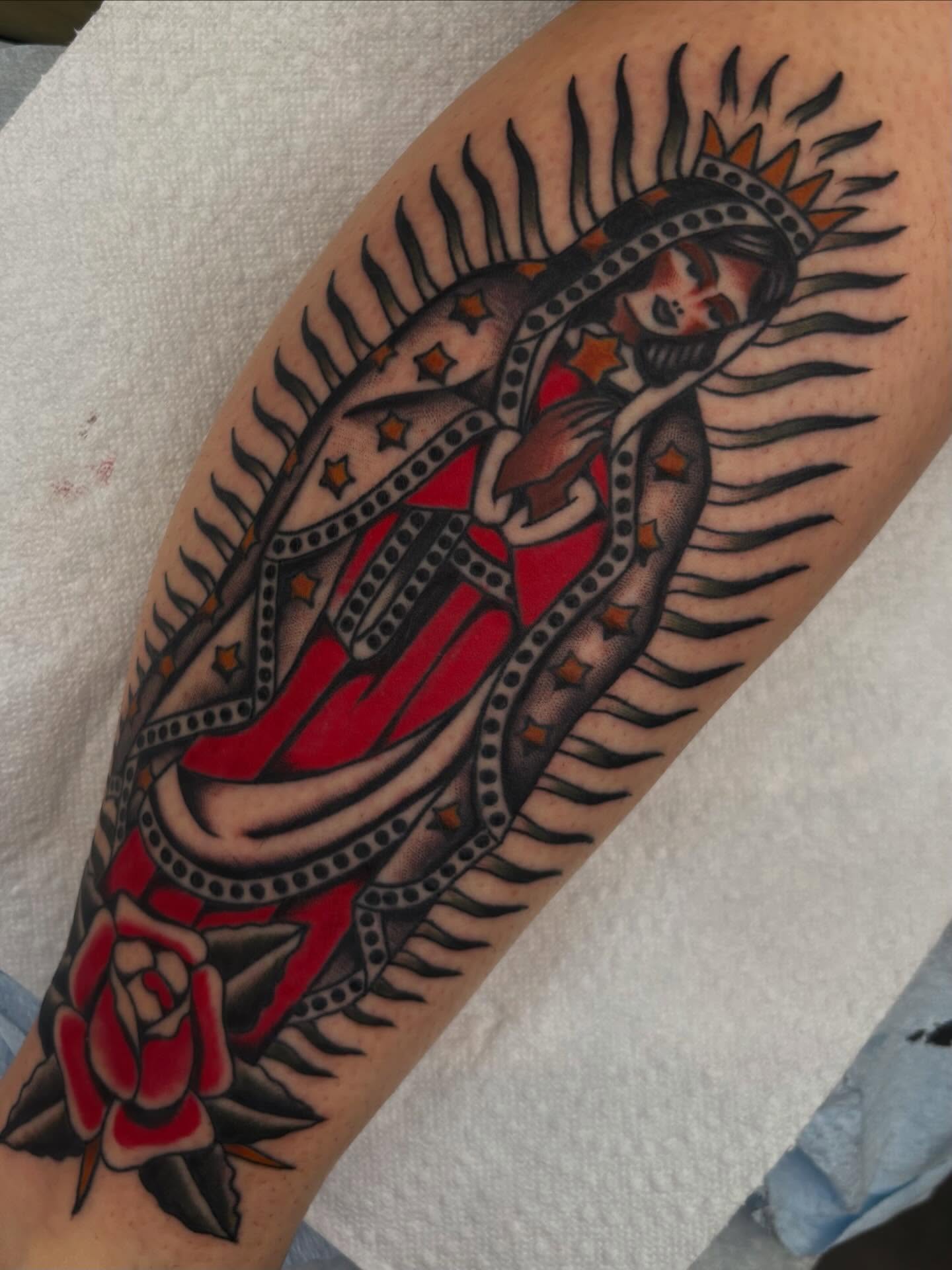 Our Lady of Guadalupe American traditional tattoo on the forearm by Claire Anderson