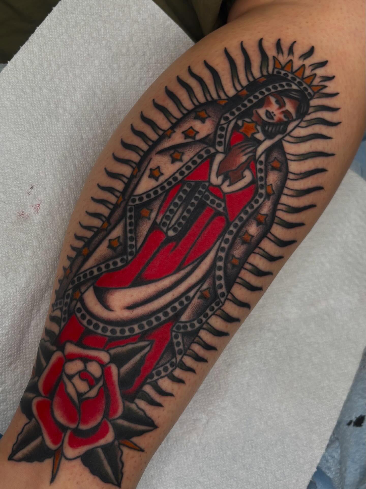 Our Lady of Guadalupe American traditional tattoo on the forearm by Claire Anderson