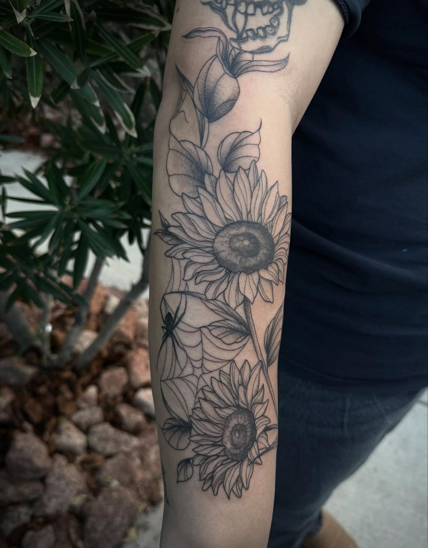 Sunflowers realism tattoo on the forearm by abbie michelle