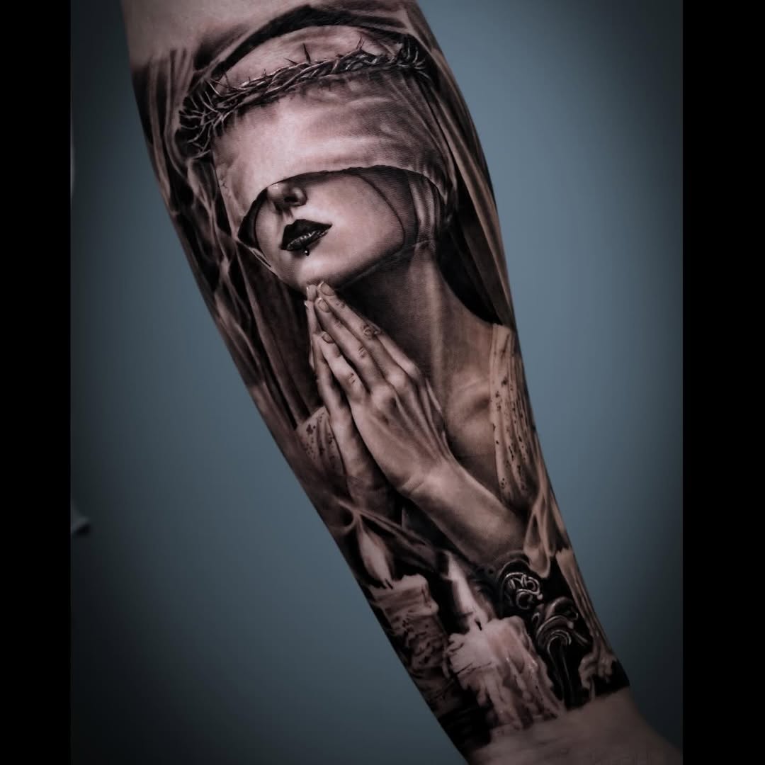 Chicano tattoo on the forearm by Pitasso tattoo black and grey