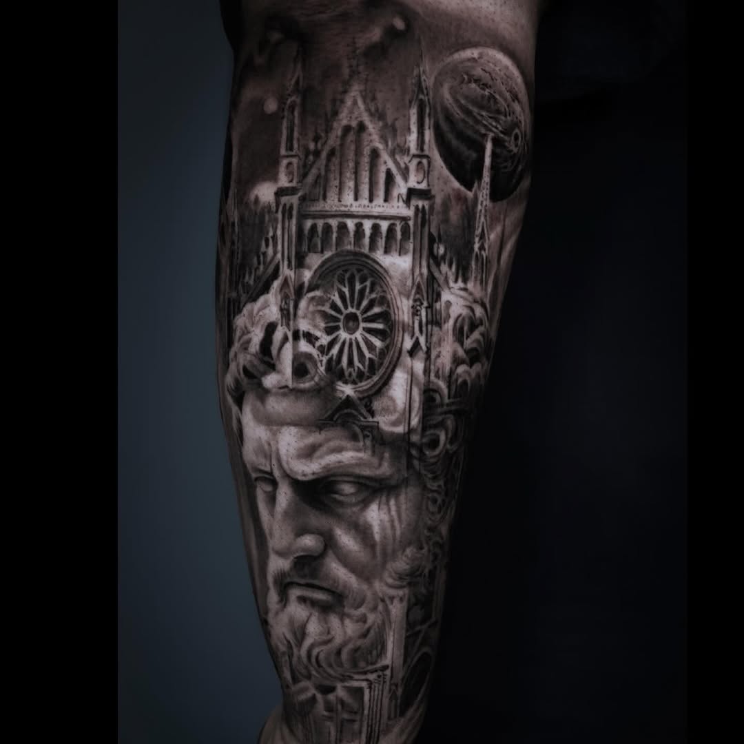 Statue head and cathedral surrealism tattoo on the forearm by Pitasso tattoo black and grey