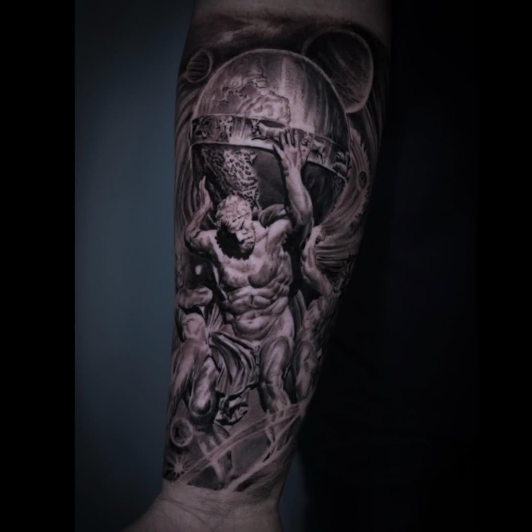 Atlas holding the globe realism tattoo on the forearm by Pitasso tattoo black and grey
