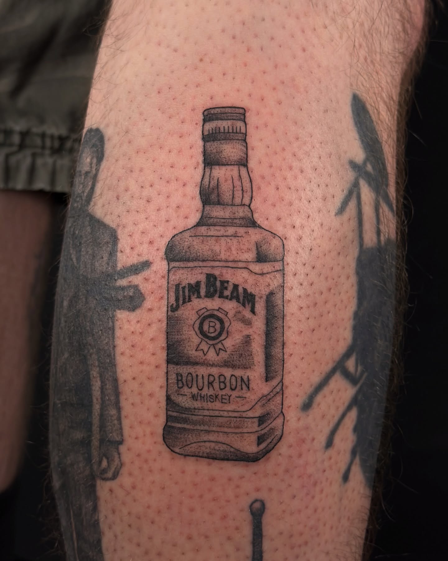 Jim Beam bourbon bottle dotwork tattoo on the forearm by ollie b ⋆⟡⋆, Dayton, Ohio