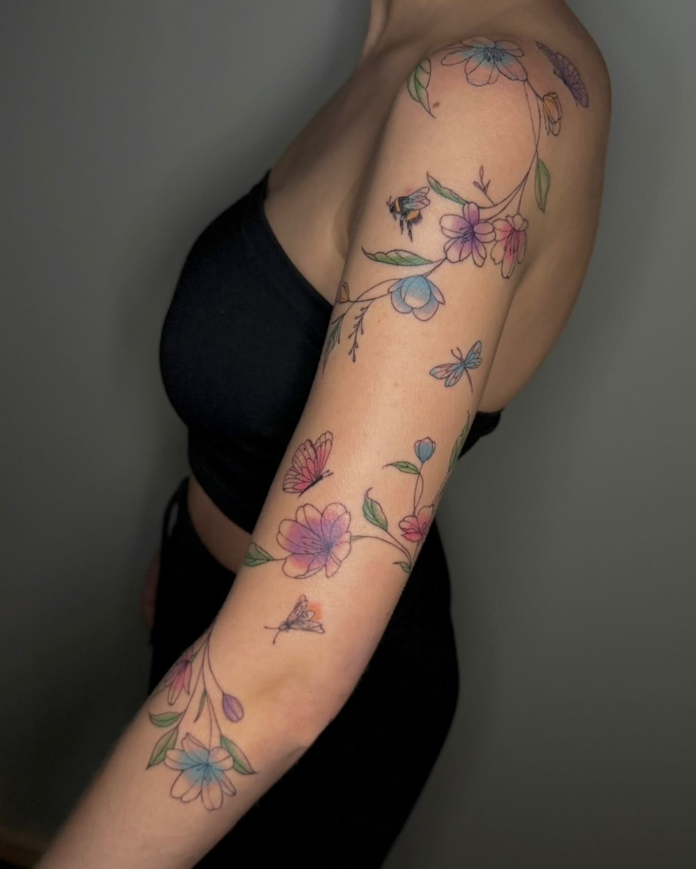 Floral vine new school tattoo on the forearm by Brandi 🕷, Mentor, Ohio