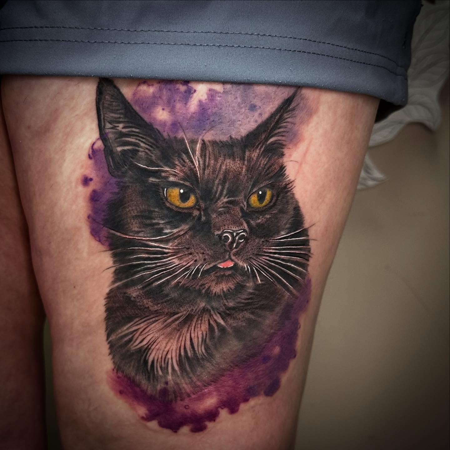 Cat realism tattoo on the thigh by Heather Tattoos Danvers MA