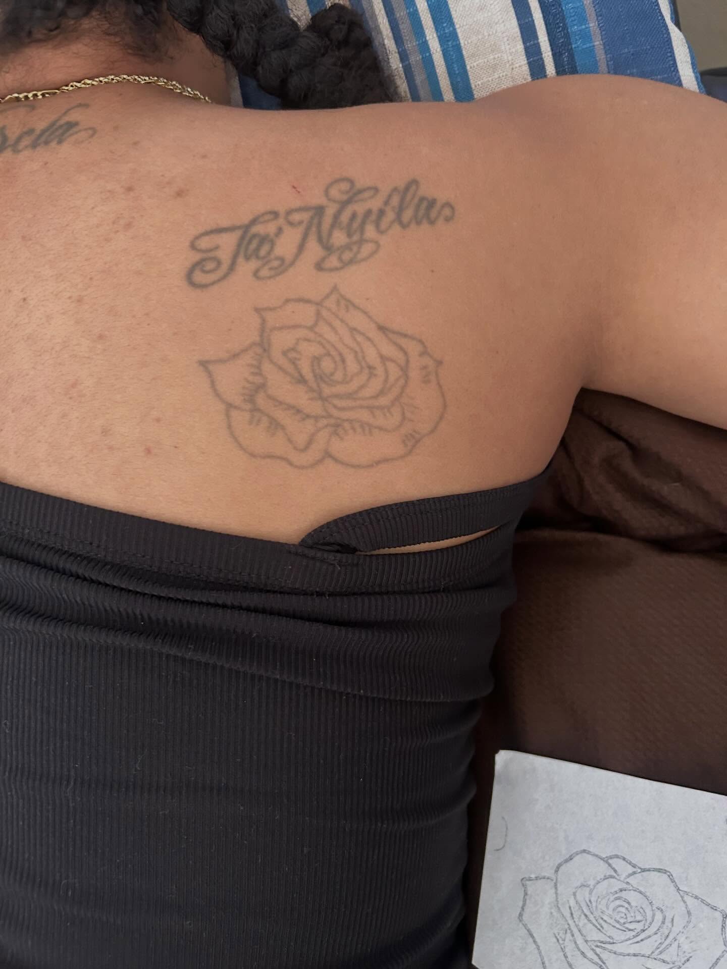 Rose black and grey tattoo on the back by Sarah Sharee💃🏽