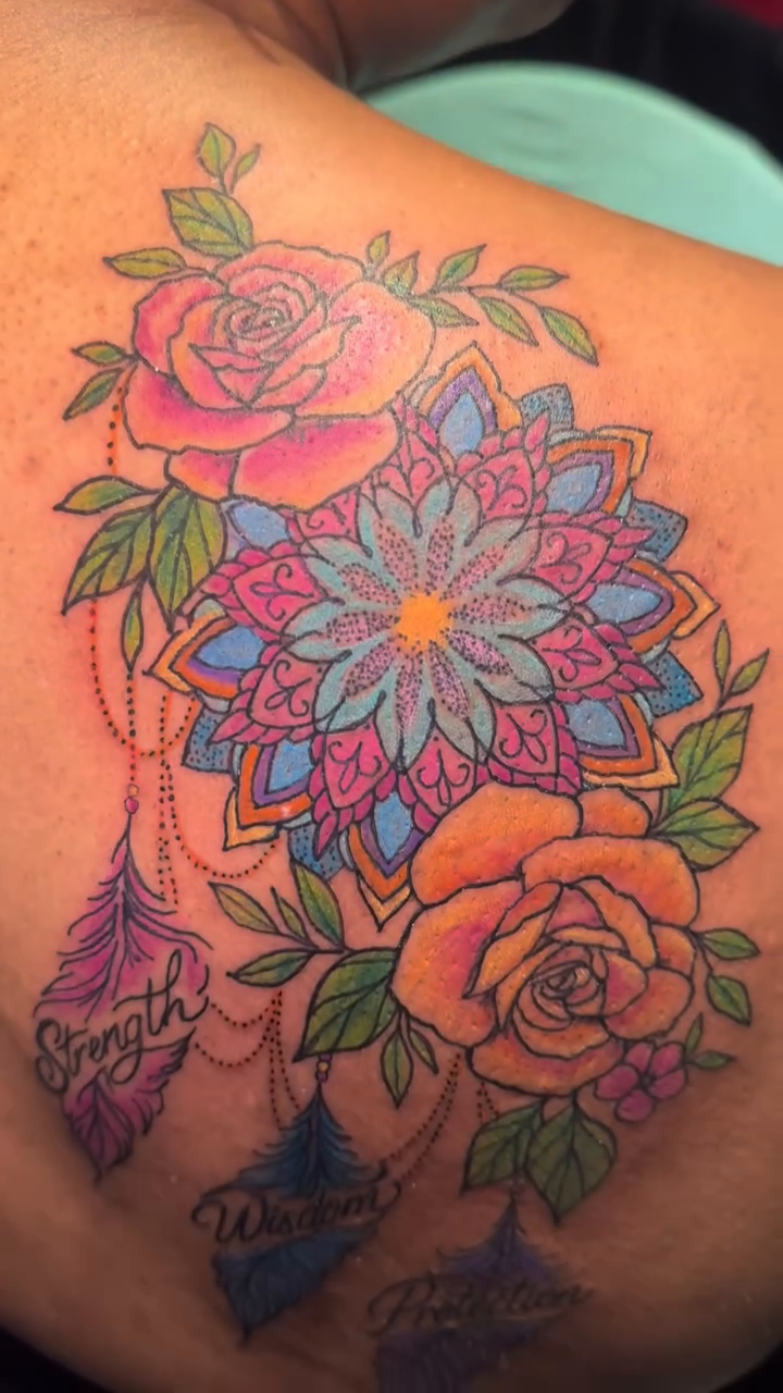 Dreamcatcher with flowers and names neo-traditional tattoo by Zen Forbes