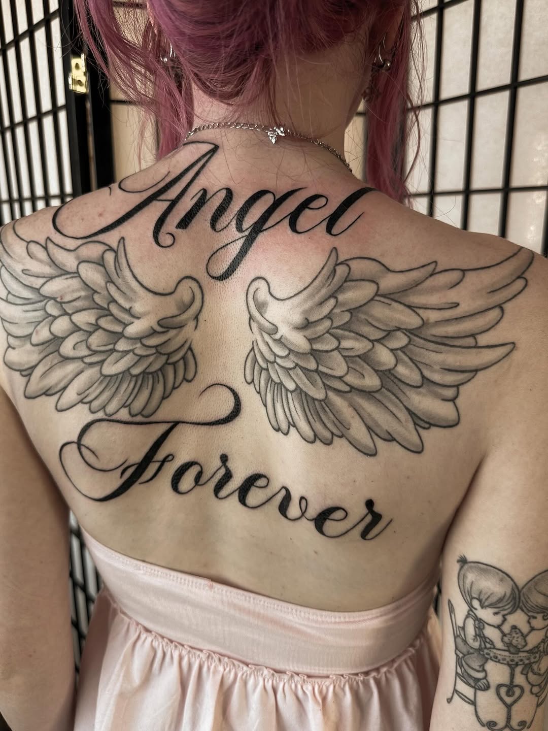 Tattoo by @into.thegraves — lettering_script, black_and_grey