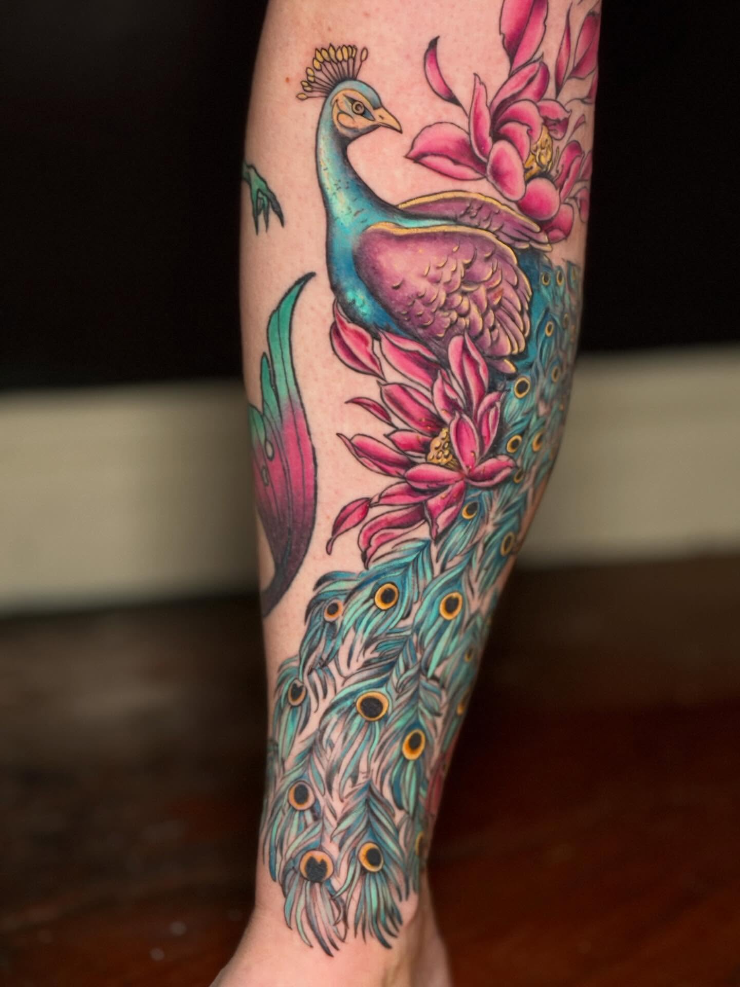 Peacock and lotus new school tattoo on the forearm by Giovanna Kline
