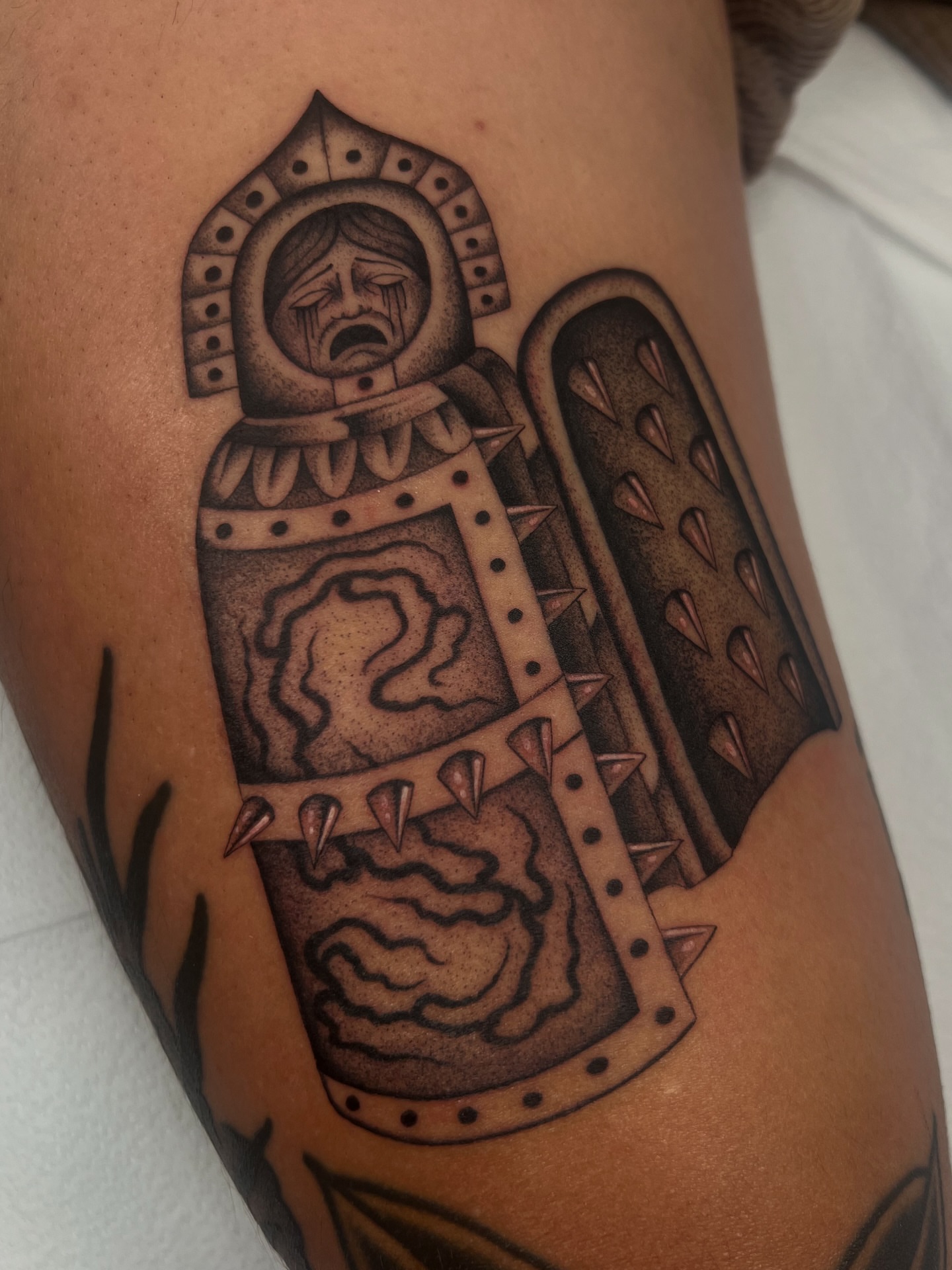 Astronaut black and grey tattoo on the forearm by Cassidy Maples