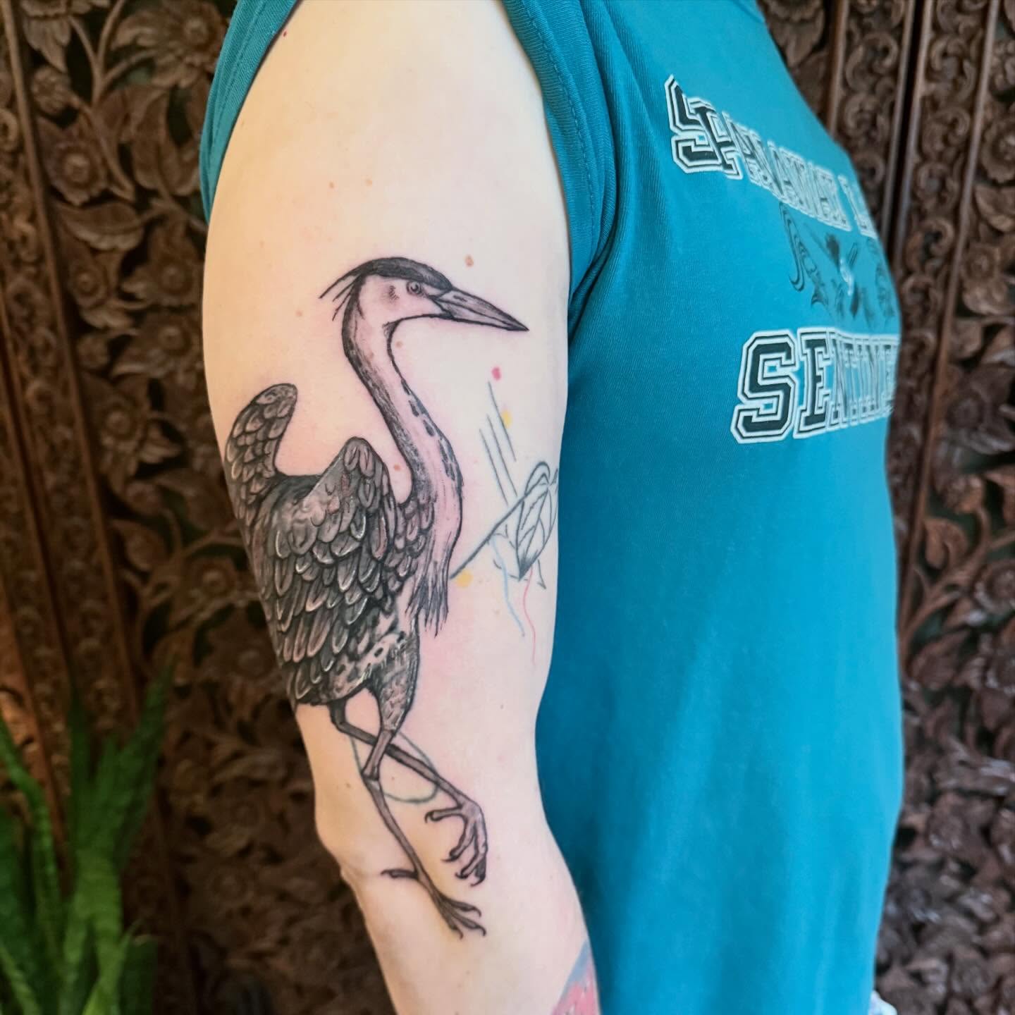 Heron black and grey tattoo on the forearm by Emily Rose Lumsdaine