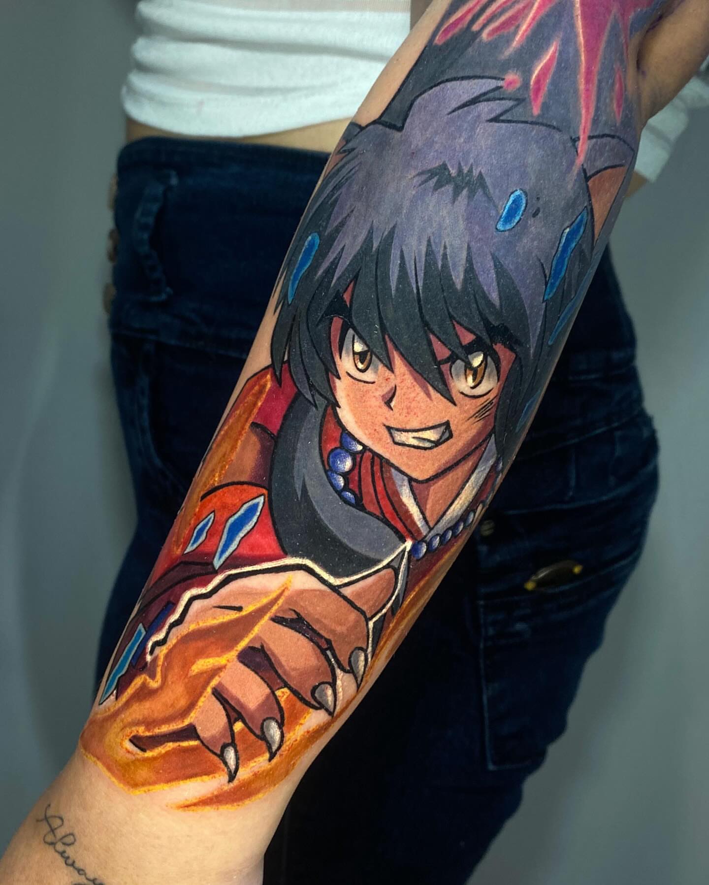 Anime character anime tattoo on the forearm by Tattoo Medellin