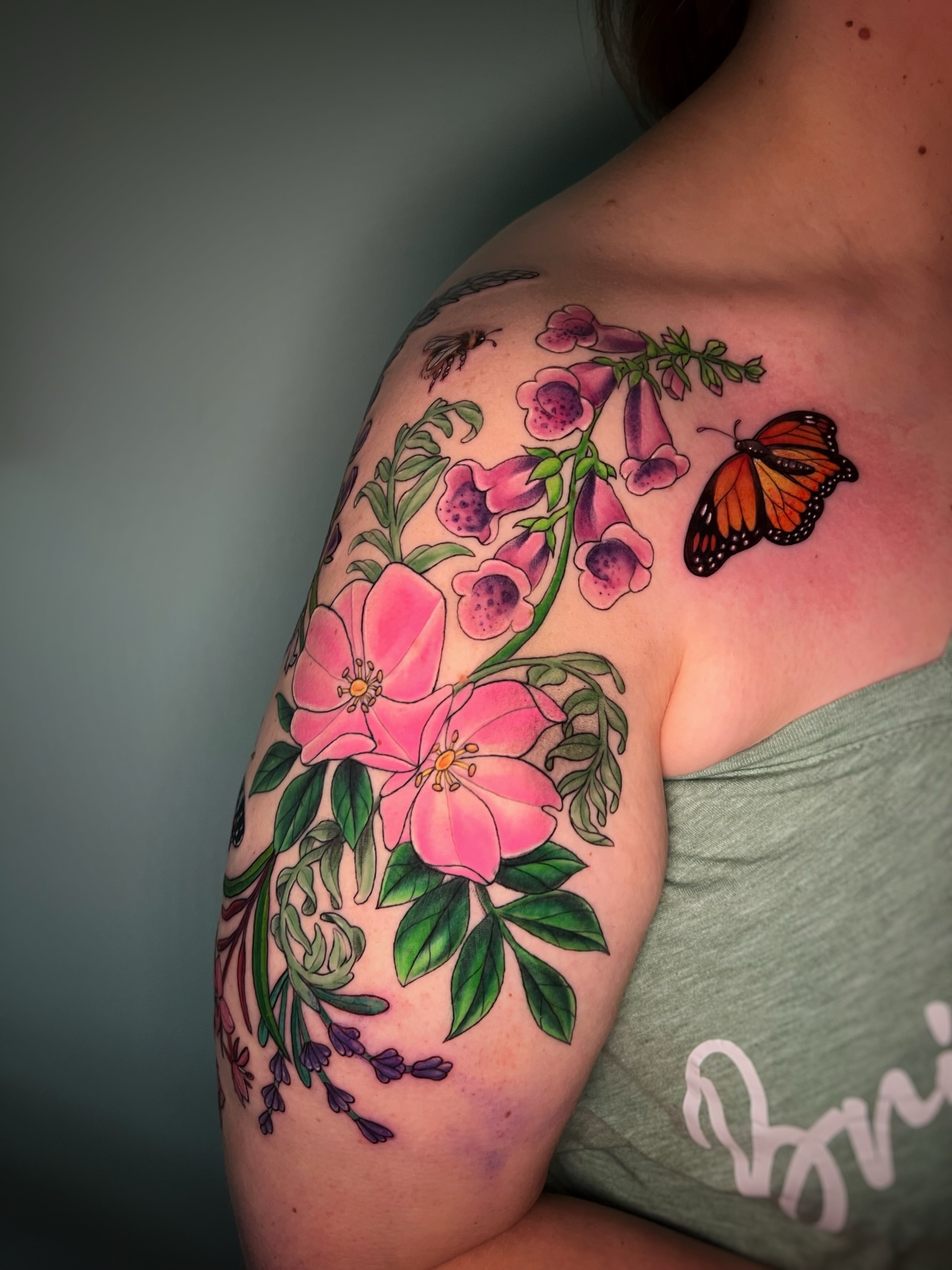 Flowers and butterfly realism tattoo on the shoulder by Michelle Pomerantz 🌼 Portland Tattoo Artist
