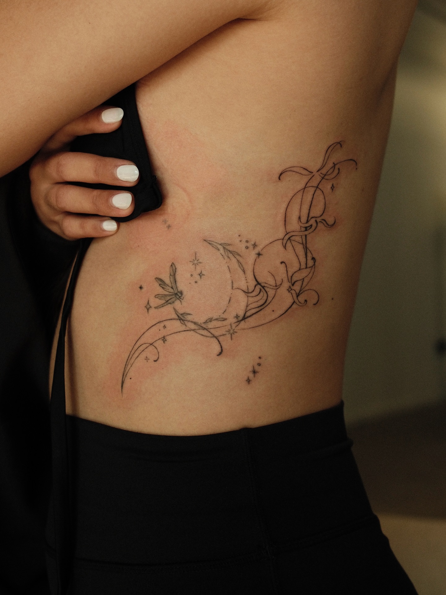 Dragon and stars black and grey tattoo on the ribs by v?