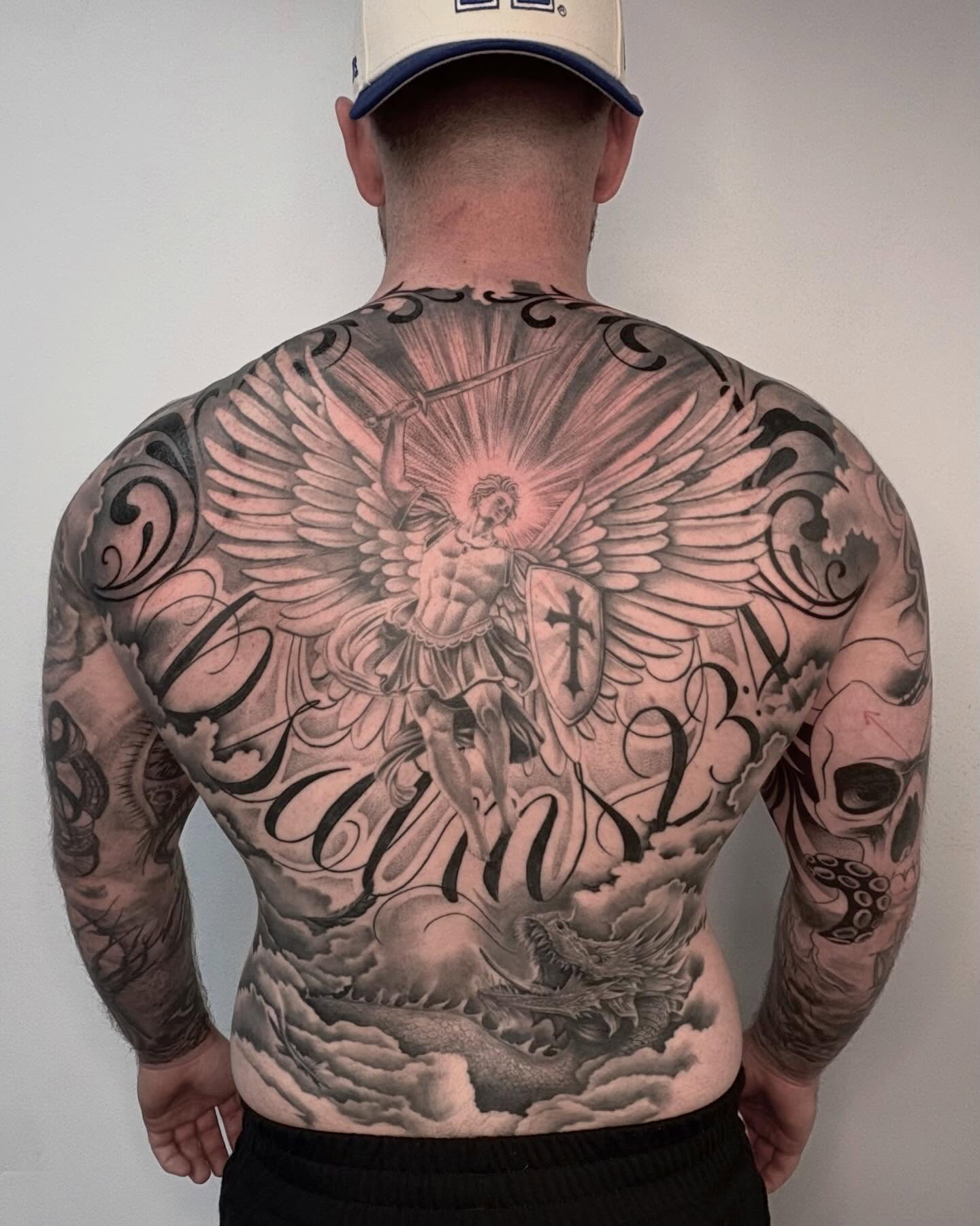 Angelic warrior realism tattoo on the back by Avery Mullins