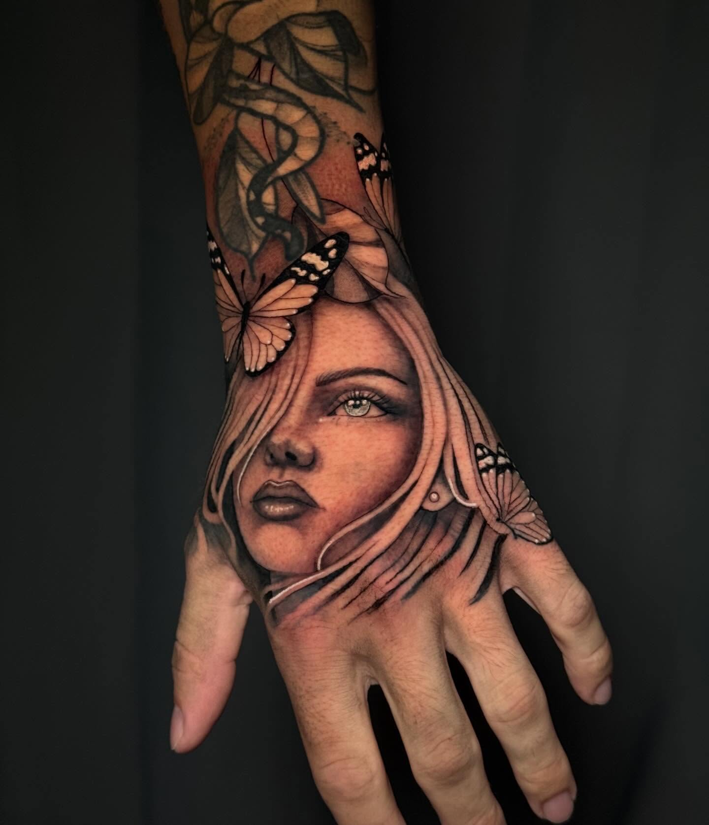 Woman's face realism tattoo on the hand by Andreanna Rosemarie Gabranidis, Pennsauken, New Jersey