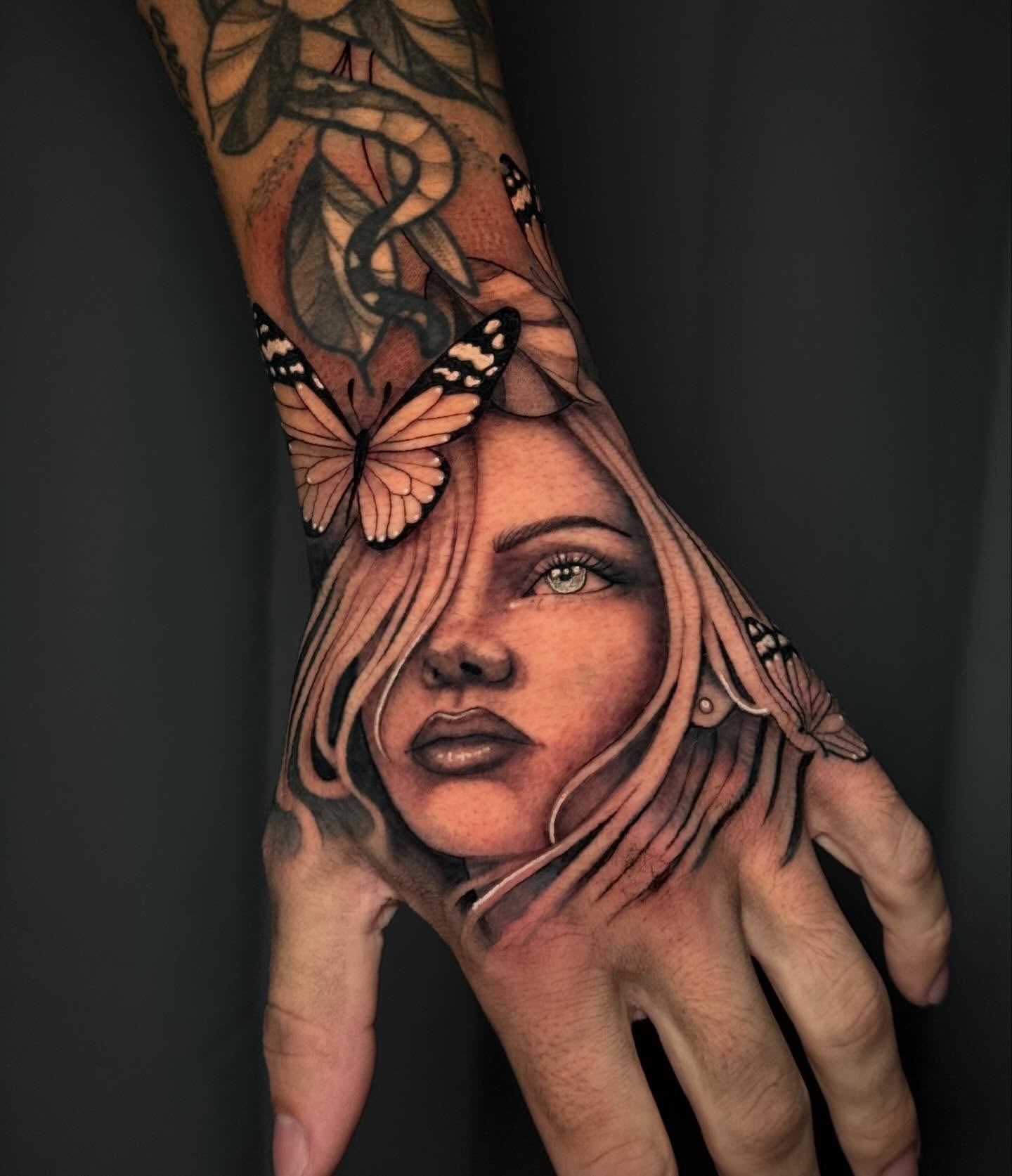Woman's face realism tattoo on the hand by Andreanna Rosemarie Gabranidis, Pennsauken, New Jersey