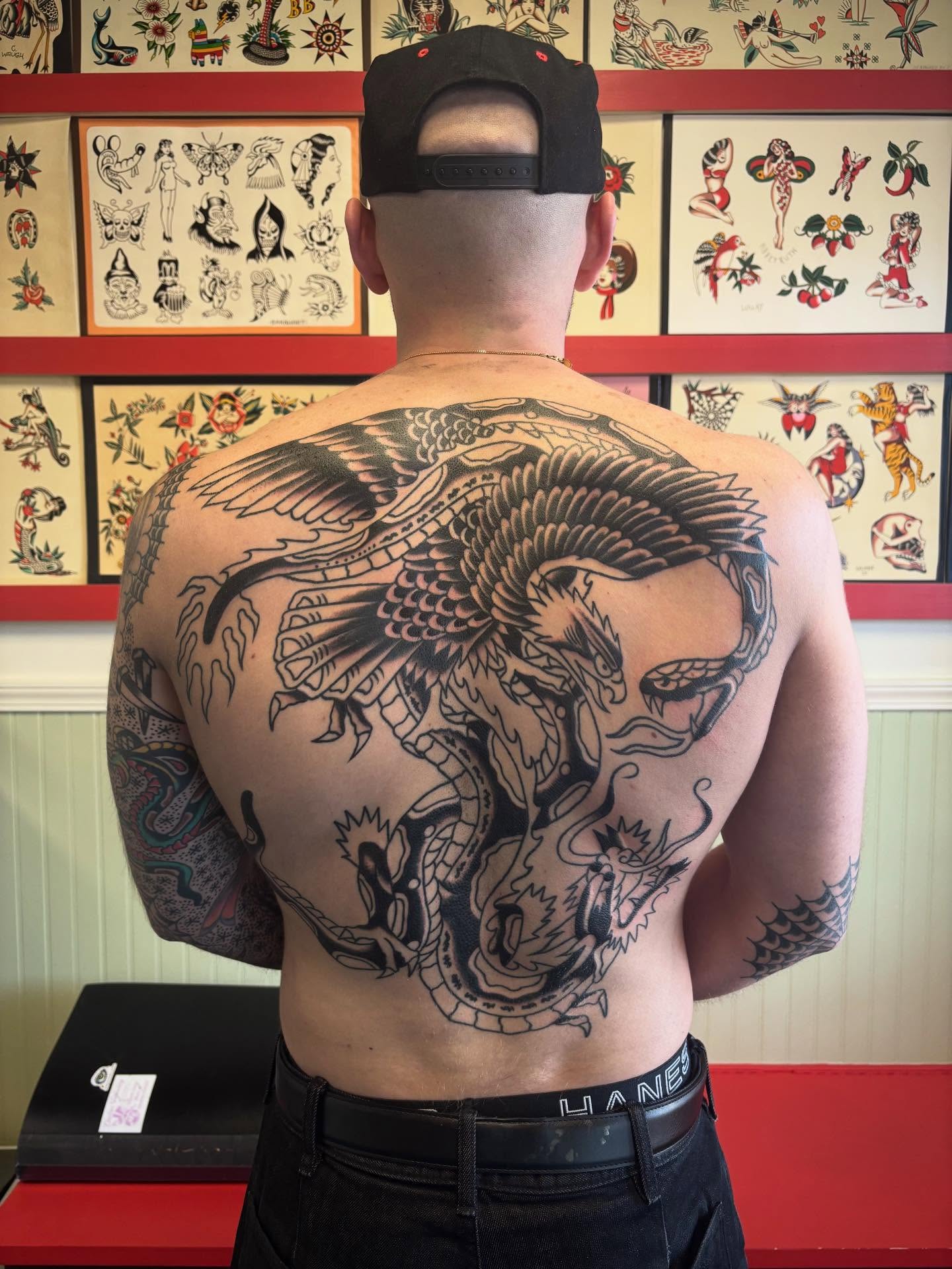 Dragon American traditional tattoo on the back by 🌹