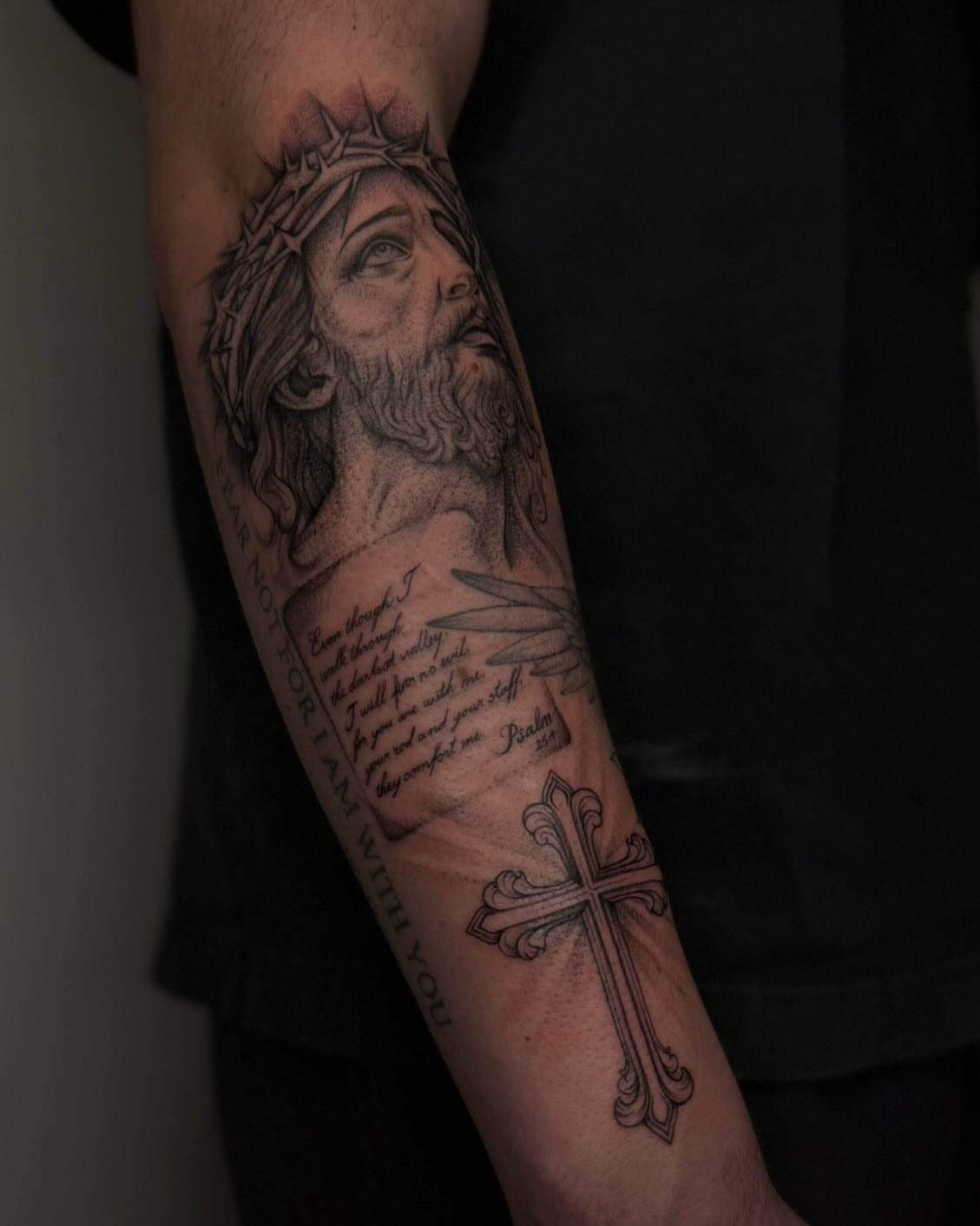 Religious figure realism tattoo on the forearm by Carson Mccullers ✨