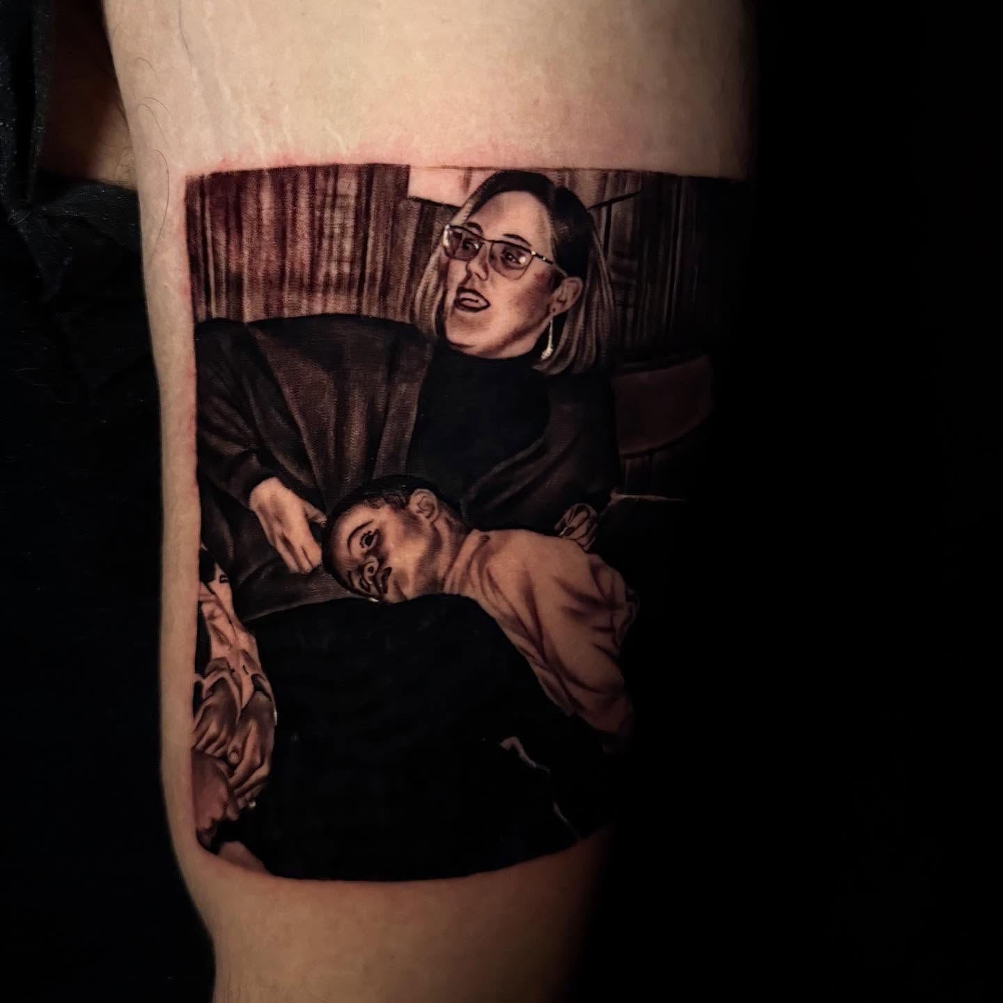 Tattoo by @thetattoosaint — realism, black_and_grey