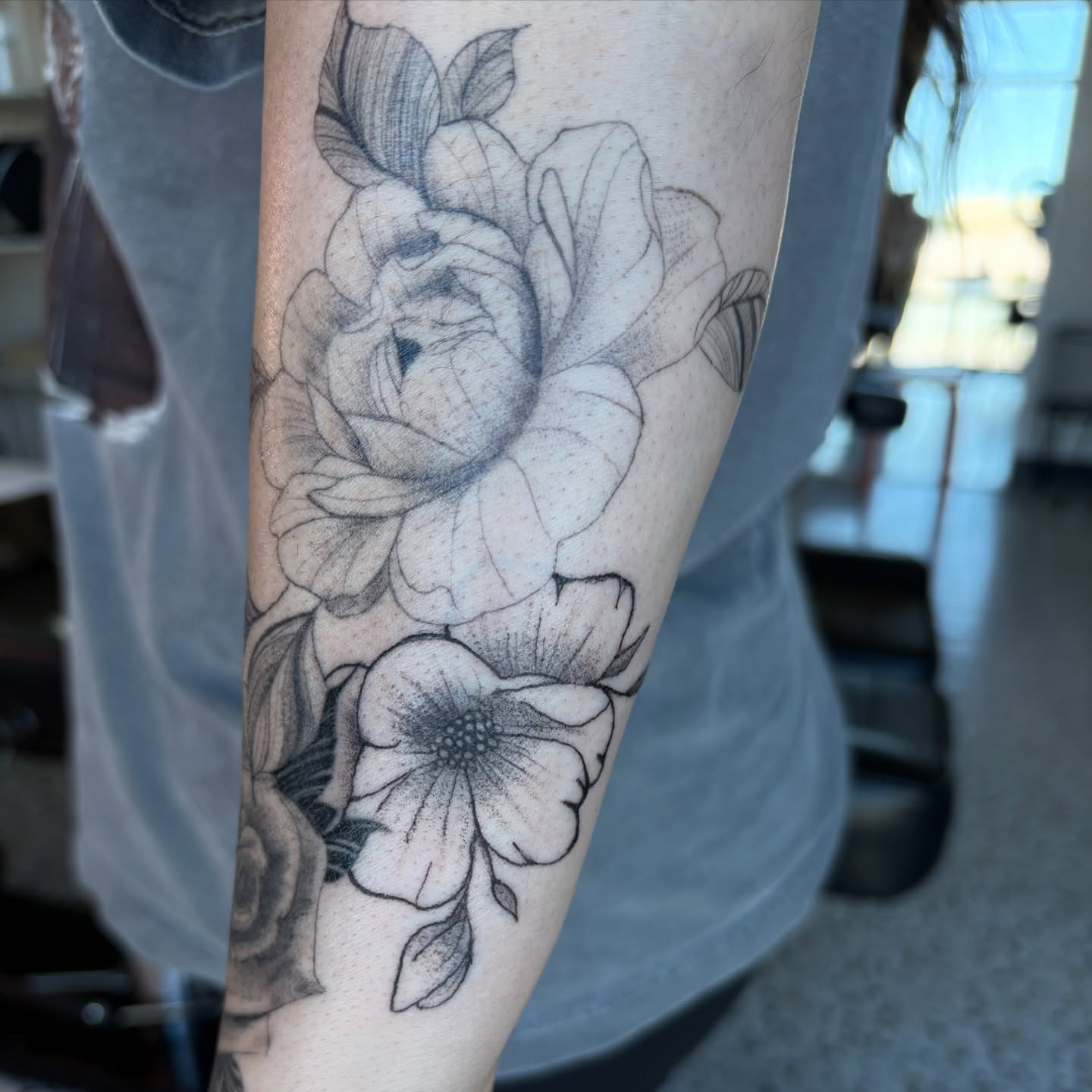 Flowers dotwork tattoo on the forearm by Cece, Las Vegas, Nevada