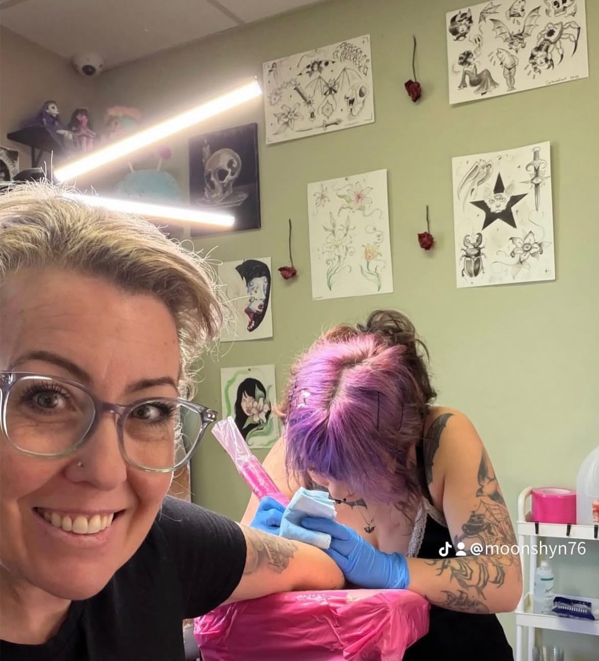 Purple hair fine line tattoo on the upper arm by Jazzy