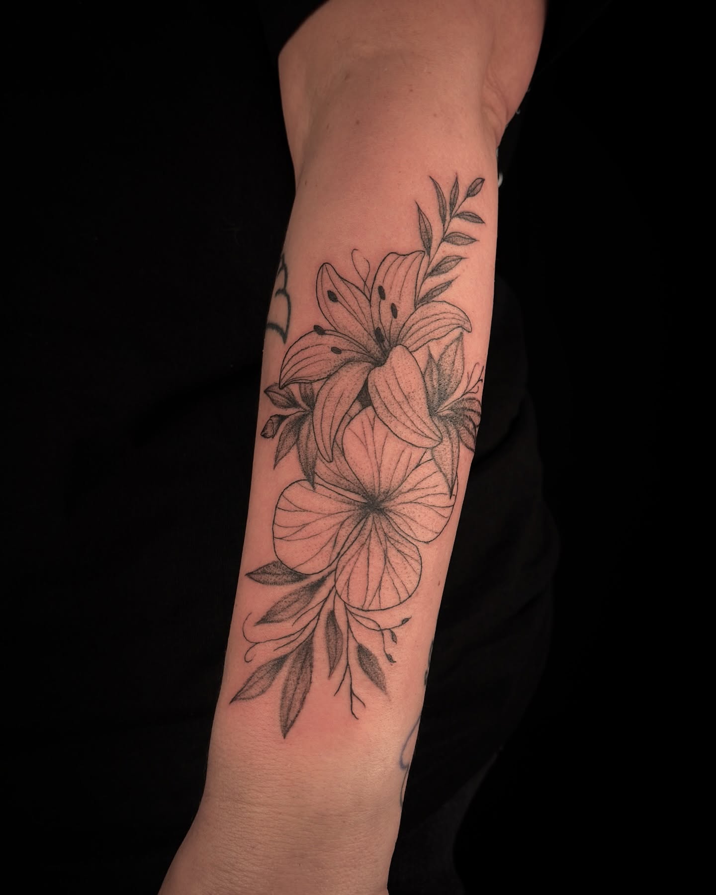 Lilies black and grey tattoo on the forearm by ollie b ⋆⟡⋆, Dayton, Ohio