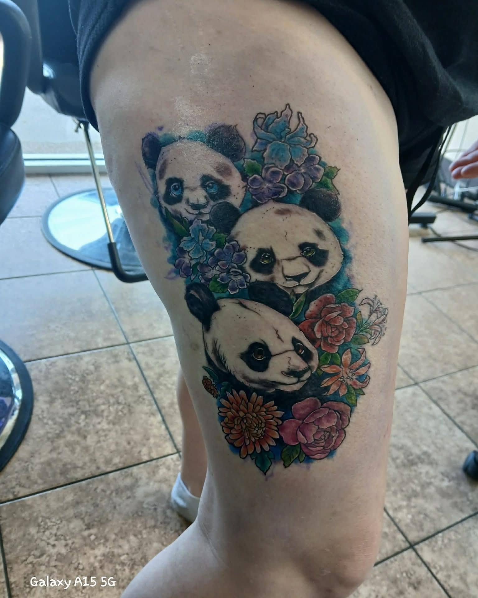 Pandas and flowers new school tattoo on the thigh by Jessica DarkRabbit