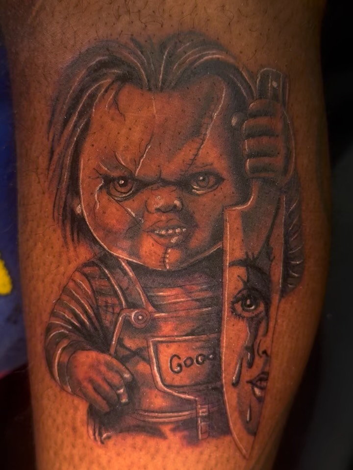 Chucky realism tattoo on the forearm by Therapy ink