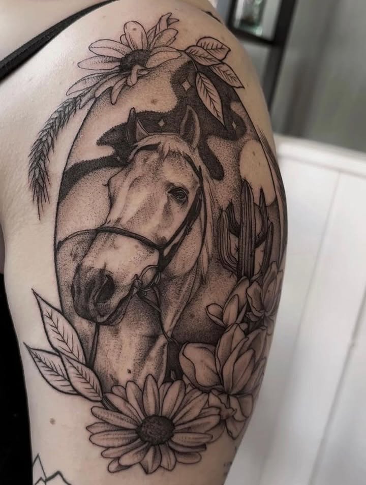 Horse and floral dotwork tattoo on the shoulder by Allexis