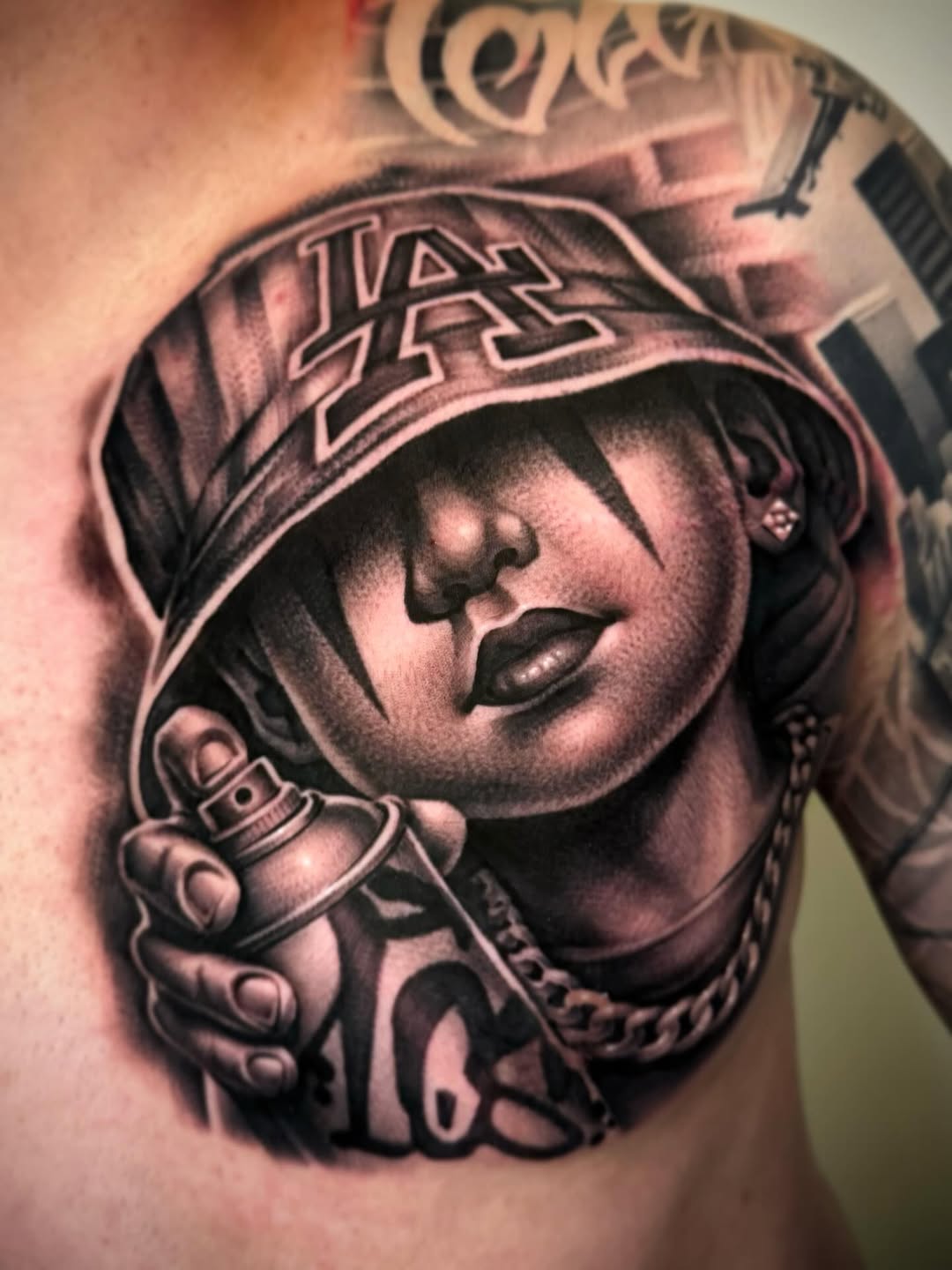 Chicano tattoo on the chest by David Torres