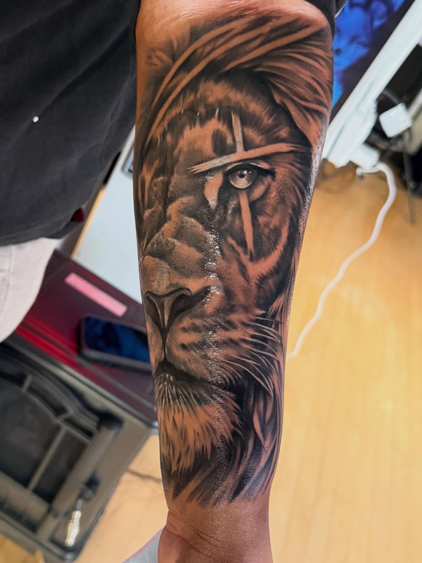 Lion realism tattoo on the forearm by LOS