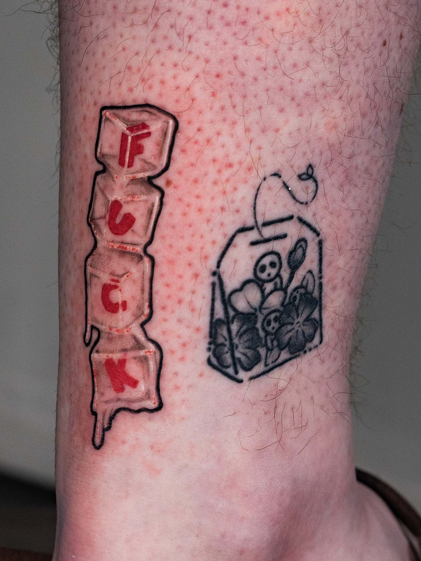 Lettering and box American traditional tattoo on the forearm by Kalin, Seattle, Washington