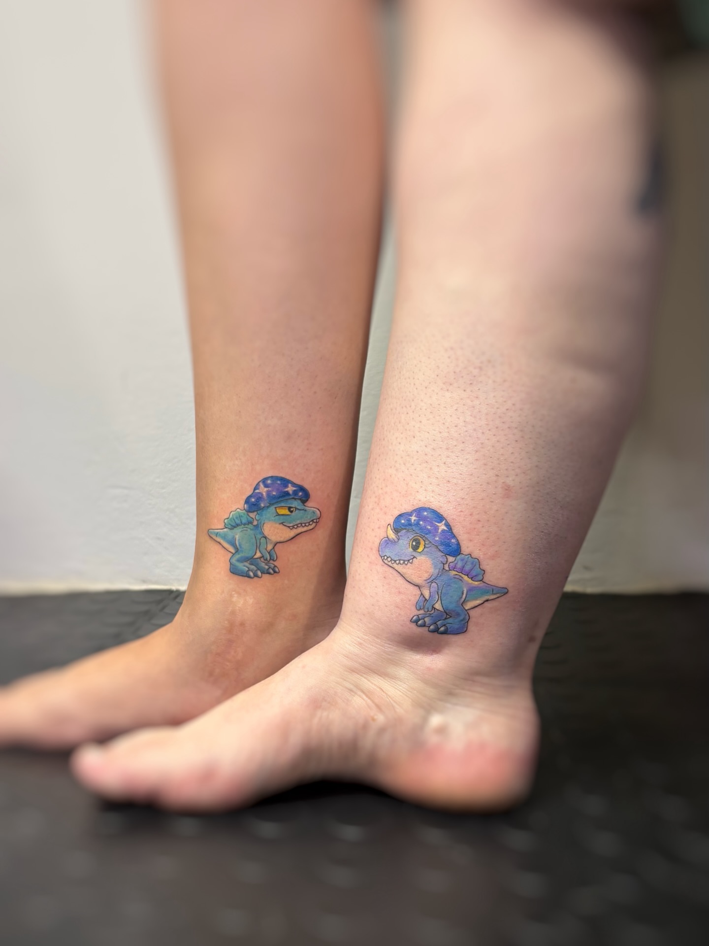 Dinosaur dotwork tattoo on the foot by Art by Aimee
