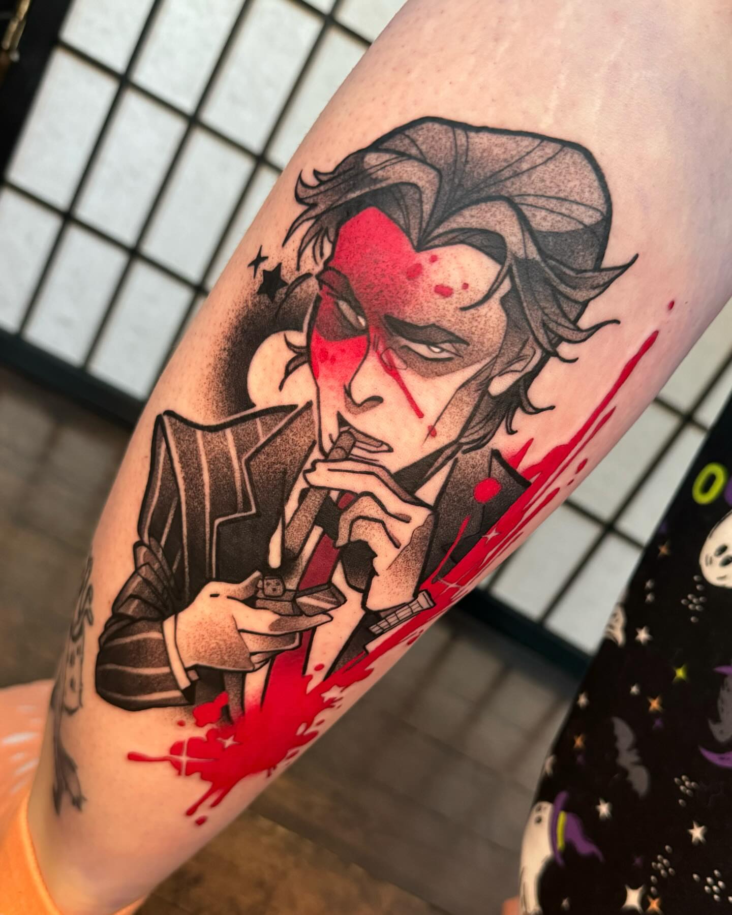 Joker character dotwork tattoo on the forearm by Taylor Nicoll Chunn