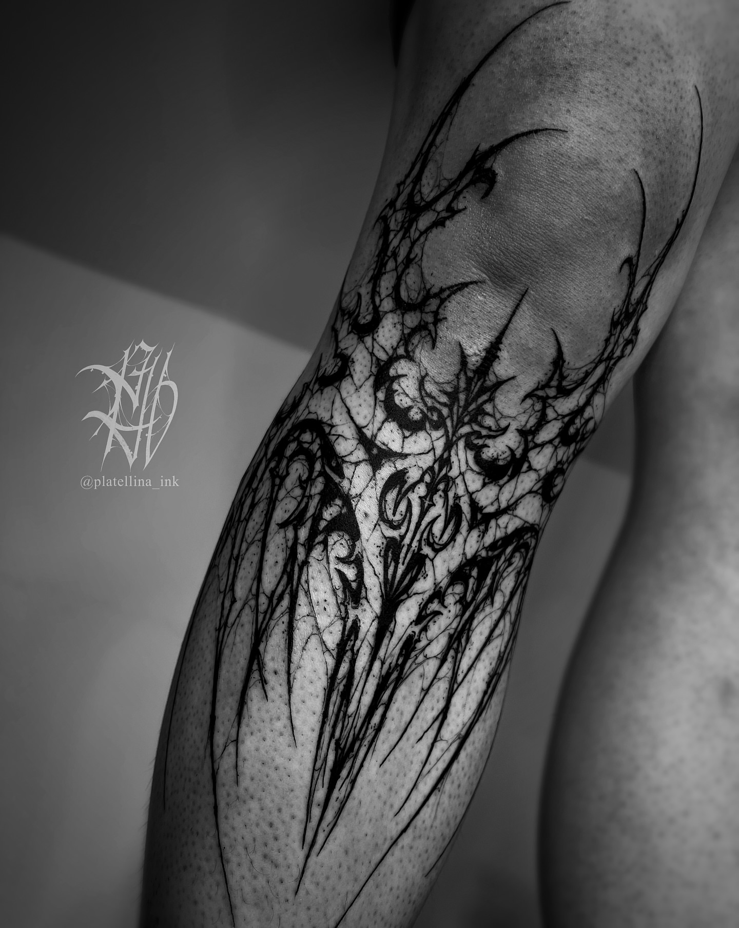 Abstract design blackwork tattoo on the forearm by Dark Gothic Tattoo